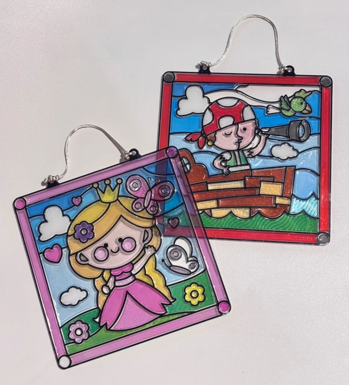 Lot de 2 Cadres plastique déco en mosaïque pirate et princesse